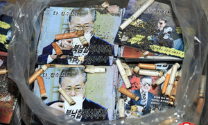 '삐라엔 삐라'… 北, ‘文 얼굴 위 담배꽁초’로 응수
