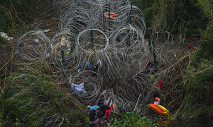 '타이틀42'…철조망에 걸린 이민자의 다급함