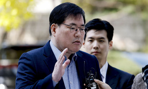 '대장동 비리' 1심서 유동규·김만배 징역 8년…법정구속