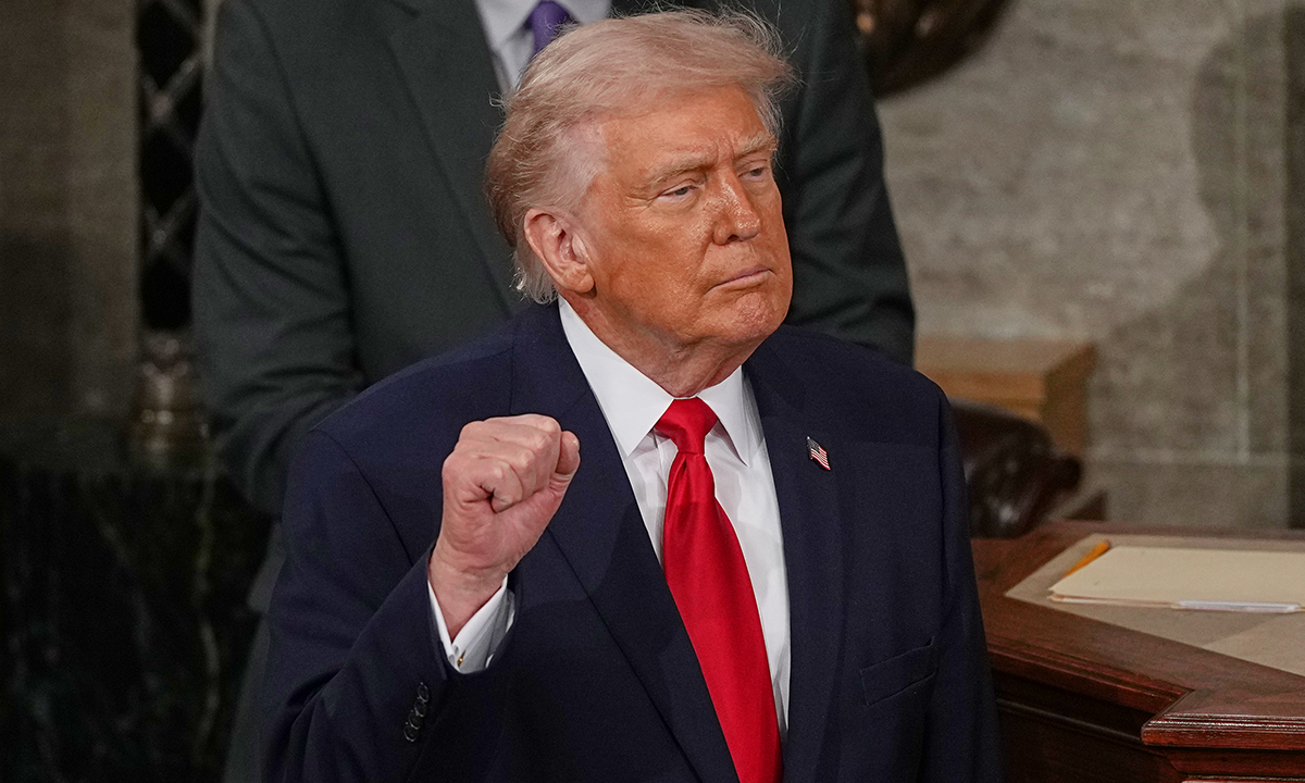 President Donald Trump gestures after delivering the State of the Union address to a joint session of Congress in the House chamber at the U.S. Capitol in Washington, Tuesday, Feb. 24, 2026. (AP Photo/Matt Rourke)