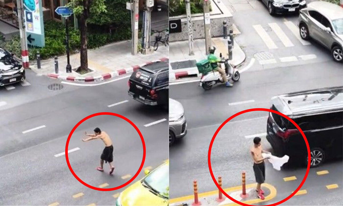 태국 방콕의 한 도로에서 상의를 탈의한 채 교통정리를 벌이고 있는 한국인 남성의 모습이다. 틱톡 캡처